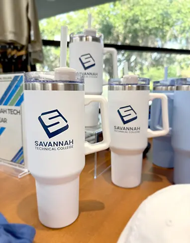 white STC drinking containers on display
